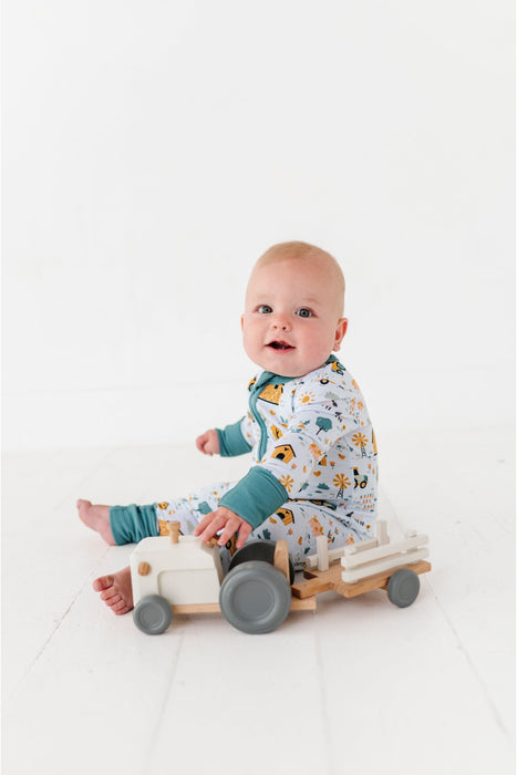 Sawyer Bamboo Fabric Baby Zip Romper Farm Animals Print on Baby by Bird and Bean