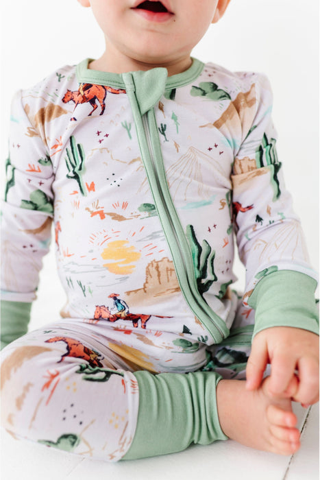 close up of billy western one piece zip on baby model