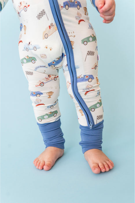 Children's sleepwear in bamboo fabric with car pattern and blue accents on a light blue background - Bird and Bean Kids