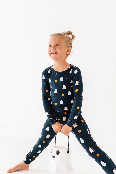 Child wearing a bamboo fabric Bird and Bean Halloween pajama set 
