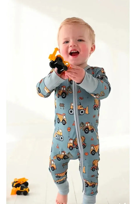  Baby model standing in Construction Worksite Bamboo Zipper Pajamas with vehicles