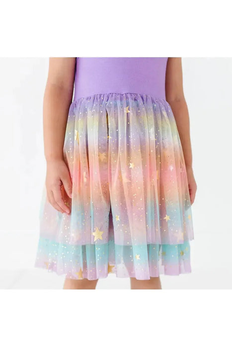 Close up of girl model wearing purple bamboo tank dress with rainbow ombre sparkle tulle skirt