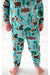 Closeup of boy model wearing green blue bamboo Woody Woodland Bear pajama set