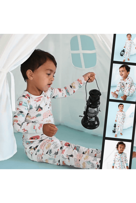 Collage of kid model wearing wearing Bamboo Desert Adventure Happy Camper Tents and Cactus Kids Pajama Set holding lantern
