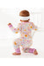 Full view baby model wearing pink floral daisy zip pjs