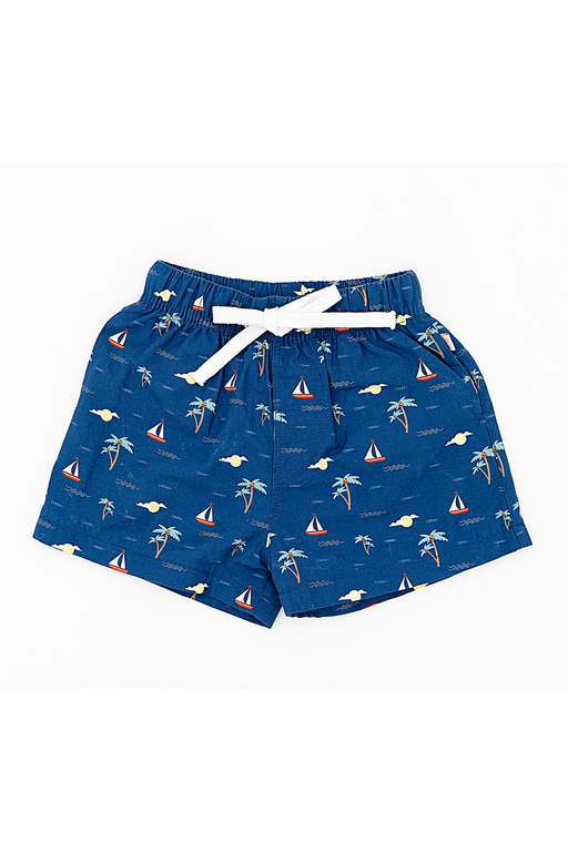 Blue kids swim shorts with tropical pattern on a white background Bird and Bean Kids