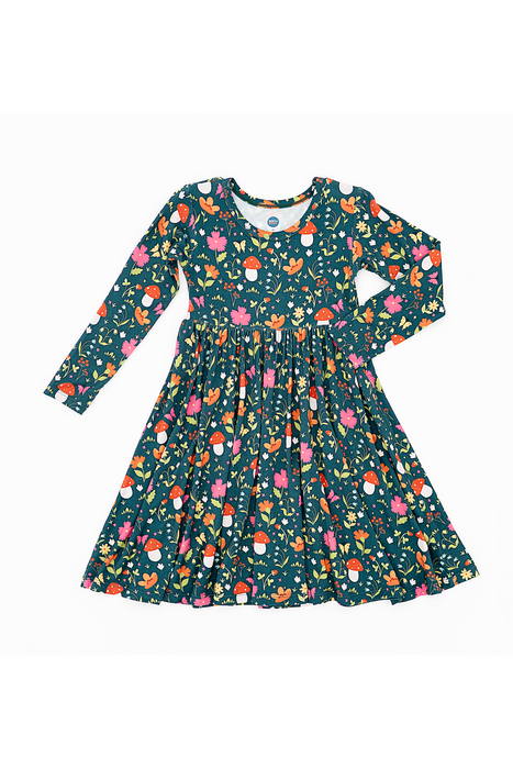 Children's dress with colorful floral and mushroom pattern on a white background | Bird and Bean 