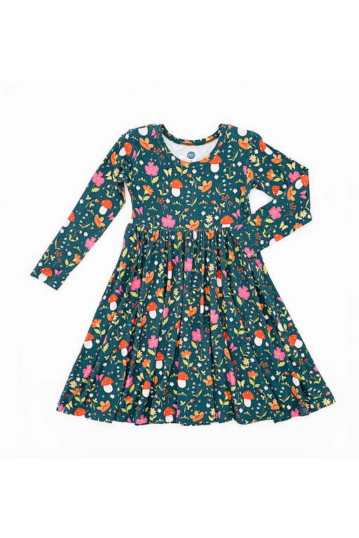 Children's dress with colorful floral and mushroom pattern on a white background | Bird and Bean 