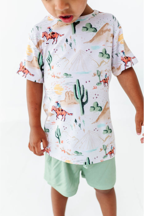 closeup of child model wearing billy cowboy western short and shirt set