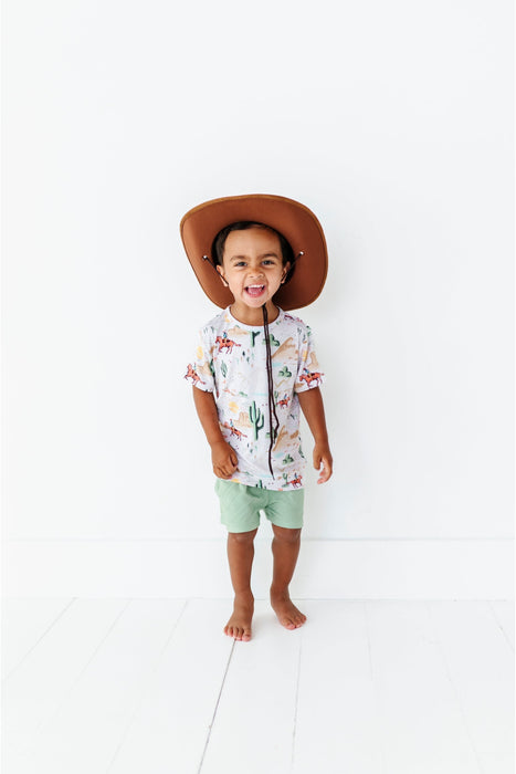 child model wearing billy cowboy western short and shirt set with cowboy hat on