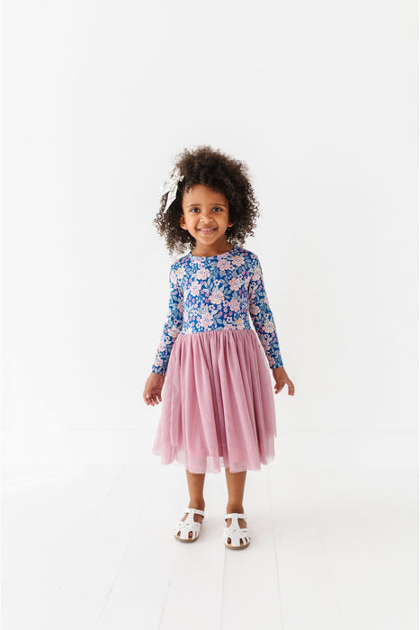 full view of posey and pink tulle skirt dress on toddler