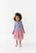 full view of posey and pink tulle skirt dress on toddler