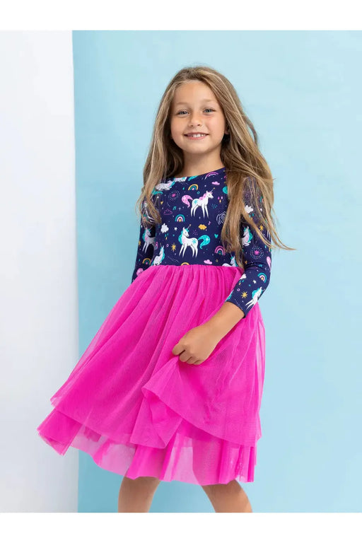 girl model wearing unicorn dress with bright pink tulle dress 