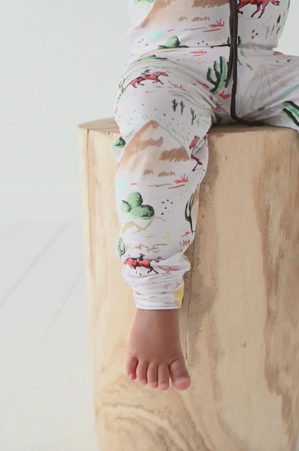 video of child model wearing billy western print pajama set